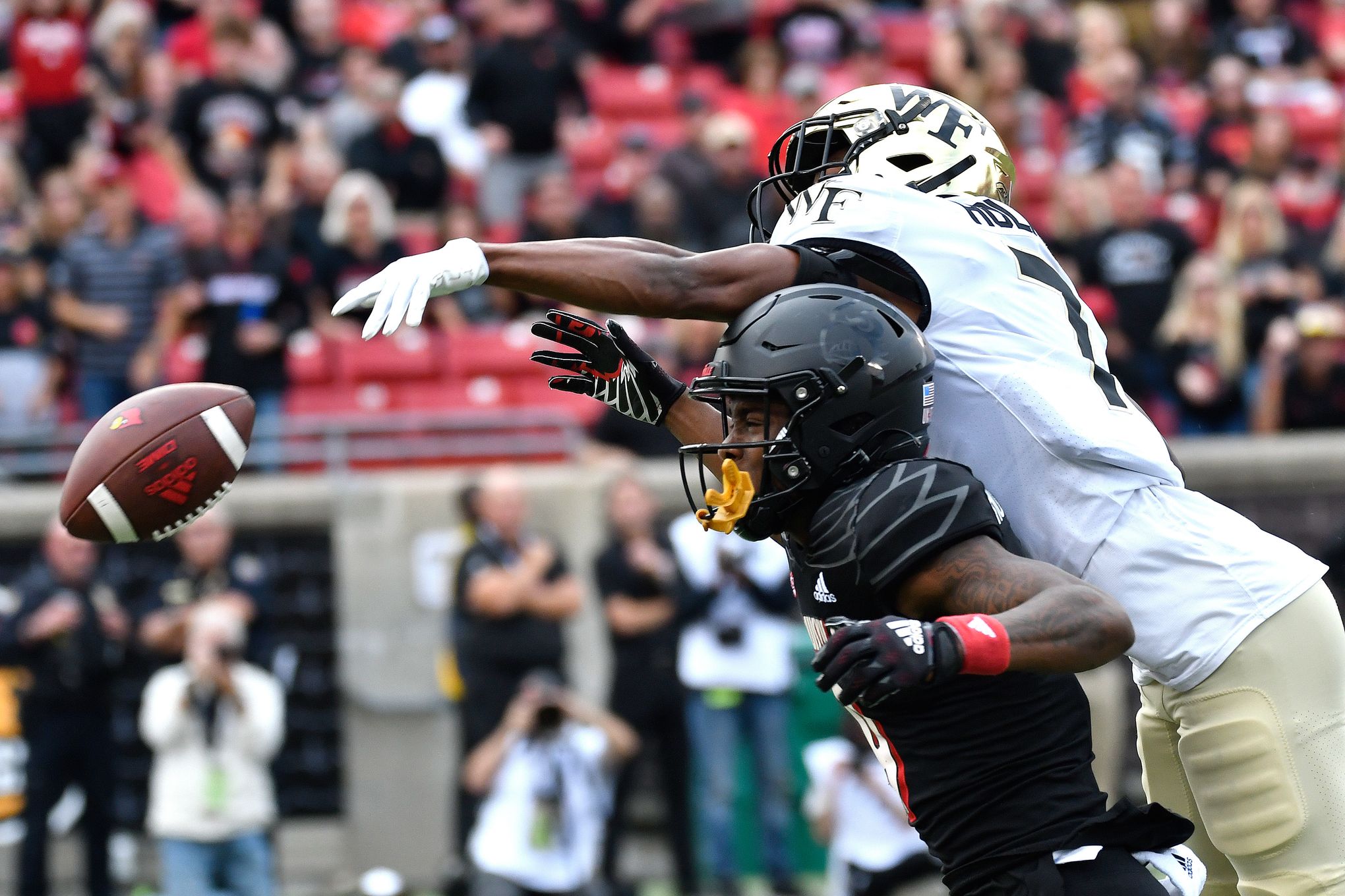 Louisville forces 8 turnovers in rout of No. 10 Wake Forest