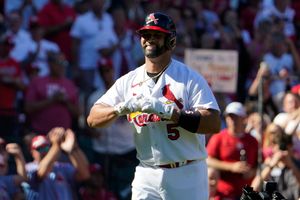 St. Louis Post-Dispatch - St. Louis Cardinals Yadier Molina, Adam Wainwright  and Albert Pujols walk off the field in the fifth inning during the game  between the Pittsburgh Pirates and St. Louis