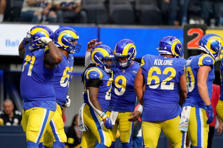 Los Angeles Rams running back Darrell Henderson runs the ball for