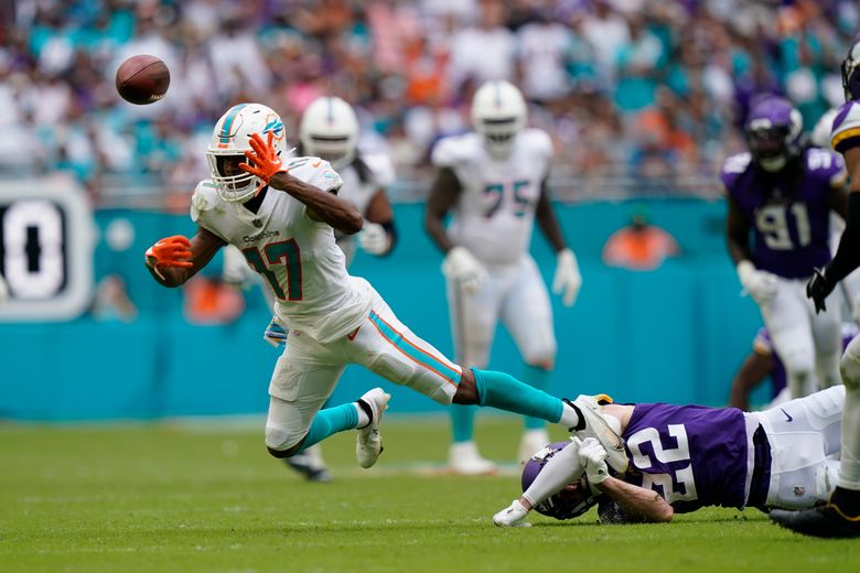 Cook's late TD ices Vikings' 24-16 win over Dolphins