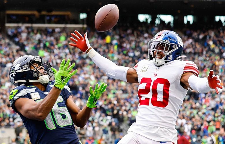 Tyler Lockett beats Giants defender Julian Love to the end zone, but he can’t keep both feet down in the second quarter. 222029