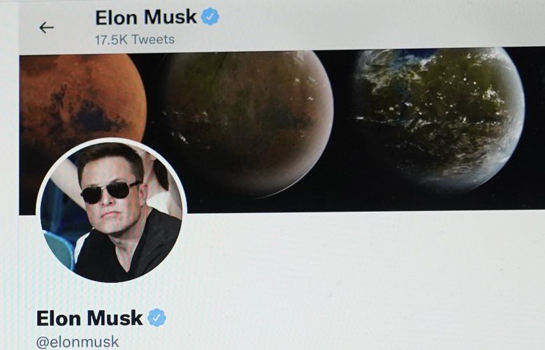 FILE – The Twitter page of Elon Musk is seen on the screen of a computer in Sausalito, Calif., on Monday, April 25, 2022.   (AP Photo/Eric Risberg, File) 