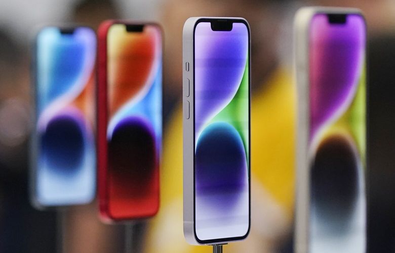 New iPhone 14 models are on display at an Apple event on the campus of Apple’s headquarters in Cupertino, Calif., Wednesday, Sept. 7, 2022. (AP Photo/Jeff Chiu)