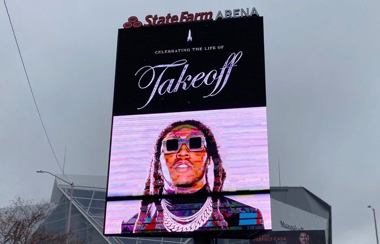 A sign announces the memorial service for slain rapper Takeoff at Atlanta’s State Farm Arena on Friday, Nov. 11, 2022. He was a member of the hip-hop trio Migos. (AP Photo/Sudhin Thanawala) GAST101 GAST101