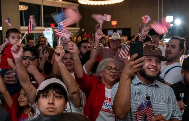 Supporters celebrate as newly elected congressional candidate Monica De La Cruz gives a speech during a watch party on Tuesday in McAllen, Tex. (Sergio Flores / The Washington Post)