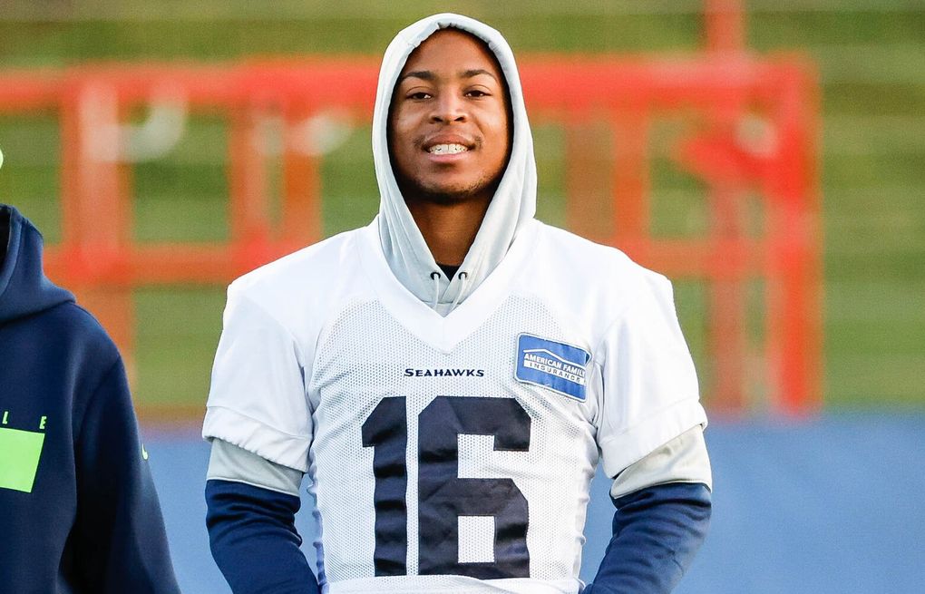 Tyler Lockett of the Seattle Seahawks waits for a timeout during a News  Photo - Getty Images