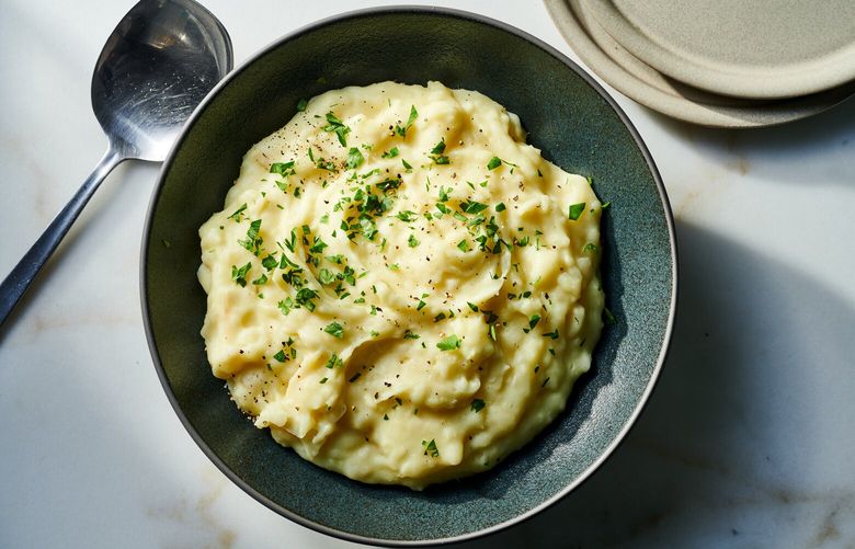 This purê de mandioca, or yuca purée, is made throughout Brazil. Milk and butter add richness to the mashed yuca. Food Stylist: Cyd Raftus McDowell. (Joe Lingeman/The New York Times.)