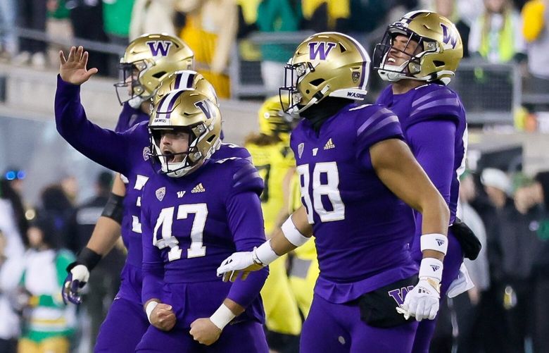 Washington Huskies kicker Peyton Henry (47) celebrates his game winning field goal during the fourth quarter. 222148