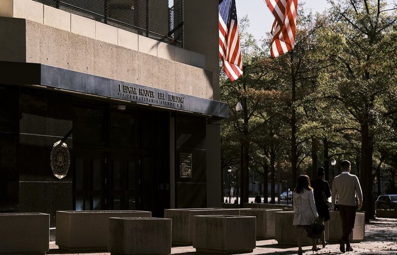 The headquarters of the Federal Bureau of Investigation in Washington, on Nov. 9, 2022. The FBI had as many as eight informants inside the far-right Proud Boys in the months surrounding the storming of the Capitol on Jan. 6, 2021, recent court papers indicate, raising questions about how much federal investigators were able to learn from them about the violent mob attack both before and after it took place. (T.J. Kirkpatrick/The New York Times) XNYT126 XNYT126
