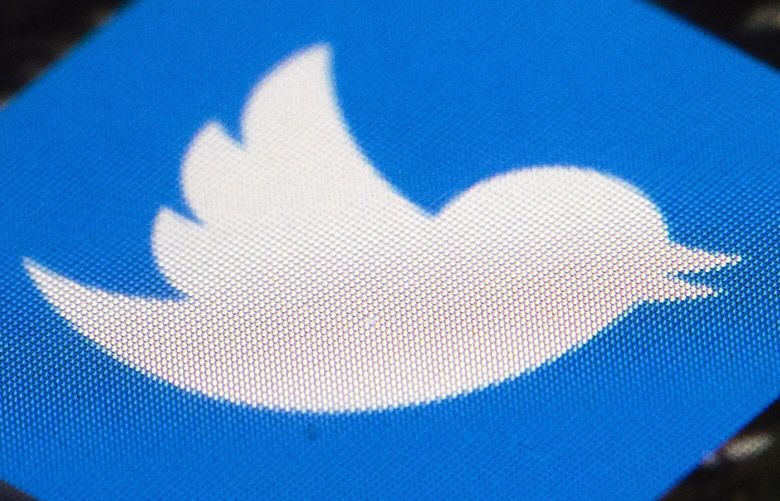 FILE – In this April 26, 2017, file photo is a Twitter app icon on a mobile phone in Philadelphia. Twitter is giving Rep. Marjorie Taylor Greene a 12-hour timeout, saying some of her tweets violated its policy against coronavirus misinformation. Twitter suspended the Republican from Georgia on Monday, July 19, 2021, after President Joe Biden urged tech companies to take stronger action against bogus claims he said are â€œkilling people.â€ Twitter says it has removed thousands of tweets and challenged millions of accounts worldwide.  (AP Photo/Matt Rourke, File)