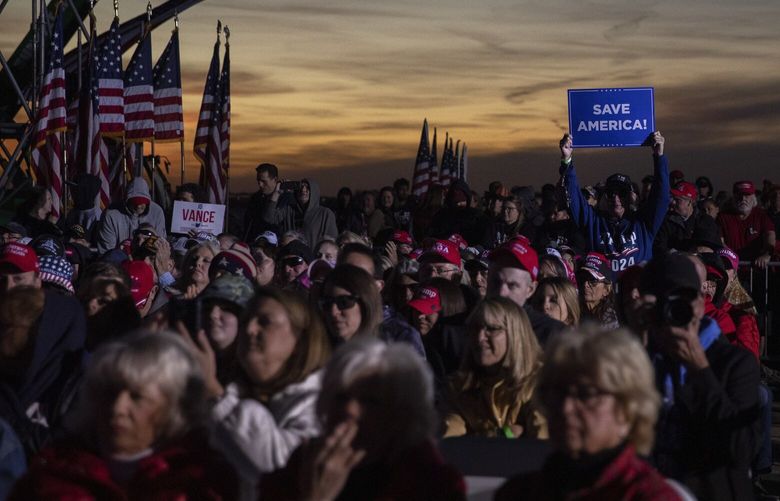 FILE – Attendees wait for former president Donald Trump to speak at a rally in Dayton, Ohio, on Nov. 7, 2022. Trump had about $100 million spread across three different political accounts as of late October – and technically the former president can’t use any of it to directly finance the presidential run he is expected to announce on Nov. 15. (Maddie McGarvey/The New York Times) XNYT32 XNYT32