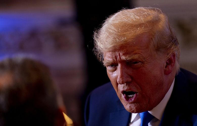 Former President Donald Trump speaks to guests at Mar-a-lago on Election Day, Tuesday, Nov. 8, 2022, in Palm Beach, Fla. (AP Photo/Andrew Harnik) OTKAH OTKAH