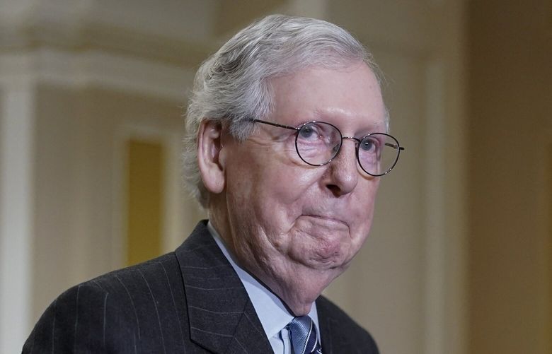 Senate Republican Leader Mitch McConnell, R-Ky., emerges from a lengthy closed-door meeting about the consequences of the GOP performance in the midterm election, at the Capitol in Washington, Tuesday, Nov. 15, 2022. (AP Photo/J. Scott Applewhite) DCSA134 DCSA134