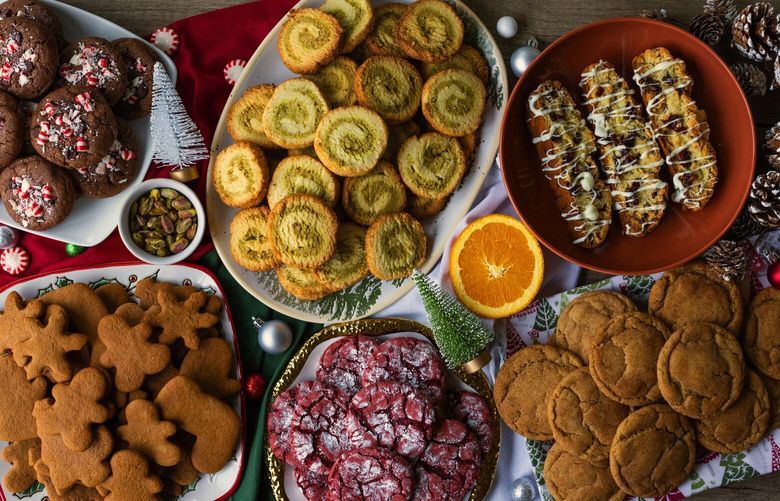 It is holiday cookie chaos, clockwise from top left: Chewy Double Chocolate Peppermint; Pistachio Pinwheels; Cranberry Orange Biscotti; Brown Butter Snickerdoodle; Red Velvet and Gingerbread, Tuesday, Oct. 25, 2022 in Seattle.