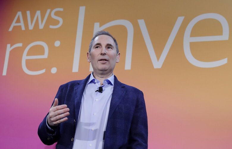 FILE – In this Dec. 5, 2019, file photo, AWS CEO Andy Jassy, discusses a new initiative with the NFL during AWS re:Invent 2019 in Las Vegas. In his first letter to Amazon shareholders, Jassy offered a defense of wages and benefits the company gives its warehouse workers while also vowing to improve injury rates inside the facilities. Jassy, who took over from Amazon founder Jeff Bezos as CEO last July, wrote the company has researched and created a list of the top 100 â€œemployee experience pain pointsâ€ and is working to solve them. A report released this week by a coalition of four labor unions found Amazon employed 33% of all U.S. warehouse workers in 2021, but was responsible for 49% of all injuries in the industry. (Isaac Brekken/AP Images for NFL, File)