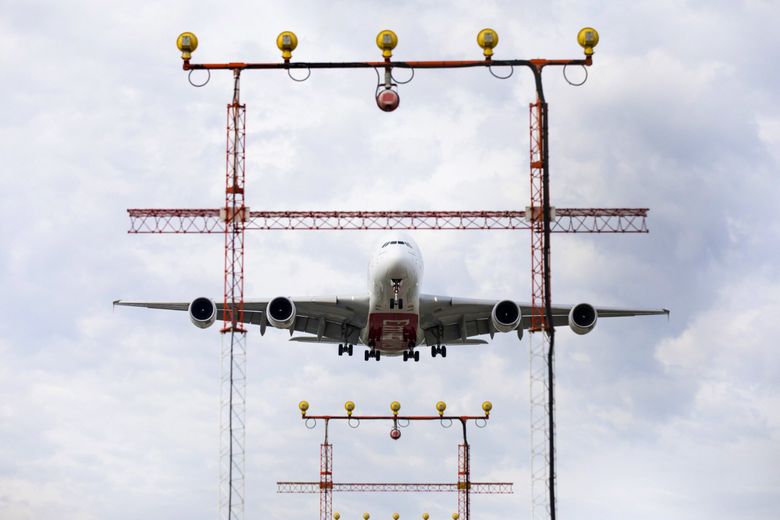 An Airbus SE A380-800 Emirates commercial airliner prepares to land at Toronto Pearson International Airport in Canada. (Brent Lewin / Bloomberg)