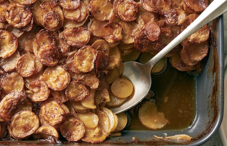 Pommes boulangere in New York, Oct. 13, 2022. This less-rich gratin uses chicken or turkey stock instead of cream. Food styled by Simon Andrews. (David Malosh/The New York Times) XNYT179 XNYT179