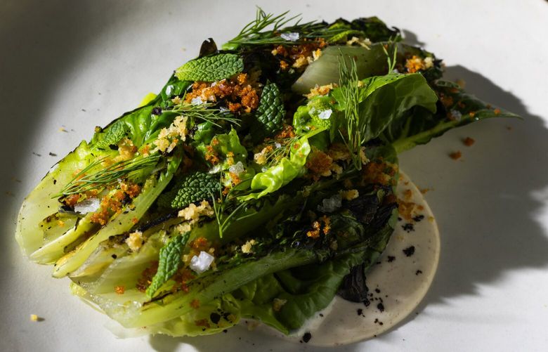 The Summer lettuces with bottarga, mint and dill at TOMO, Thursday, Aug. 11, 2022 in West Seattle’s White Center neighborhood.