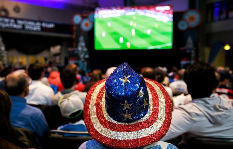 Susan Cole, of Stanwood, Wash, attends the Seattle Sounders’ watch party for Monday’s US men’s national team World Cup game versus Wales in Seattle Monday, Nov. 21, 2022. 222230