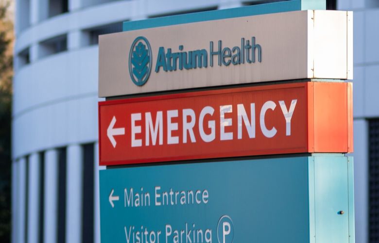 Patients who seek treatment at the Atrium Health Carolinas Medical Center in Charlotte, North Carolina, might be offered a payment plan from lender AccessOne. Nearly half the patients enrolled in an AccessOne loan are in its highest-interest loan, paying 13% interest on their medical debt, according to a KHN analysis. (Logan Cyrus for KHN)