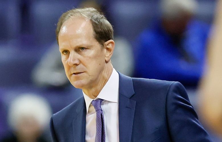 Washington Huskies head coach Mike Hopkins eyes play during the first half. 222020