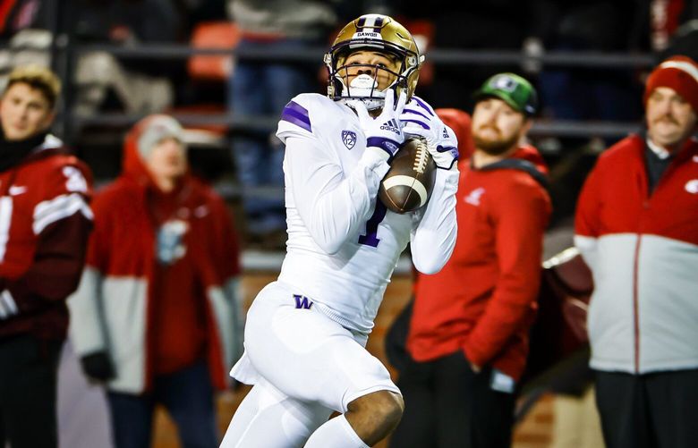 Washington wide receiver Rome Odunze makes a catch for a 47-yard touchdown as the Washington Huskies play the Washington State Cougars in Pac-12 Football Saturday, November 26, 2022 at Martin Stadium, in Pullman, WA. 222254