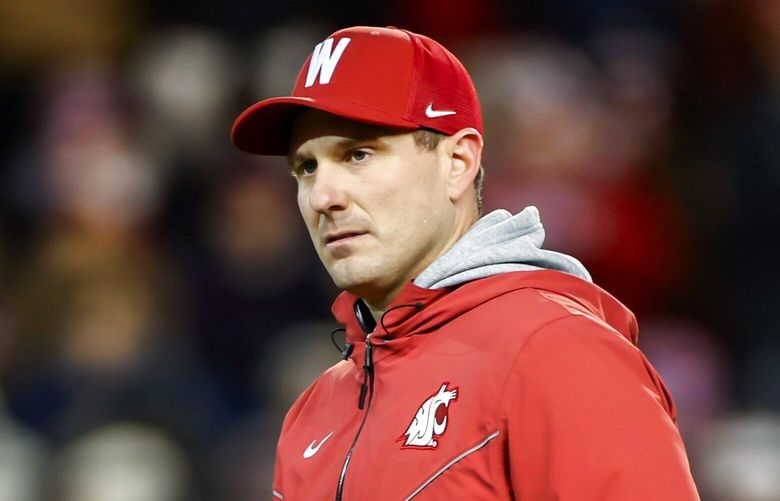 Washington State head coach Jake Dickert walks the field for warmups before the Washington Huskies play the Washington State Cougars in Pac-12 Football Saturday, November 26, 2022 at Martin Stadium, in Pullman, WA. 222254 222254