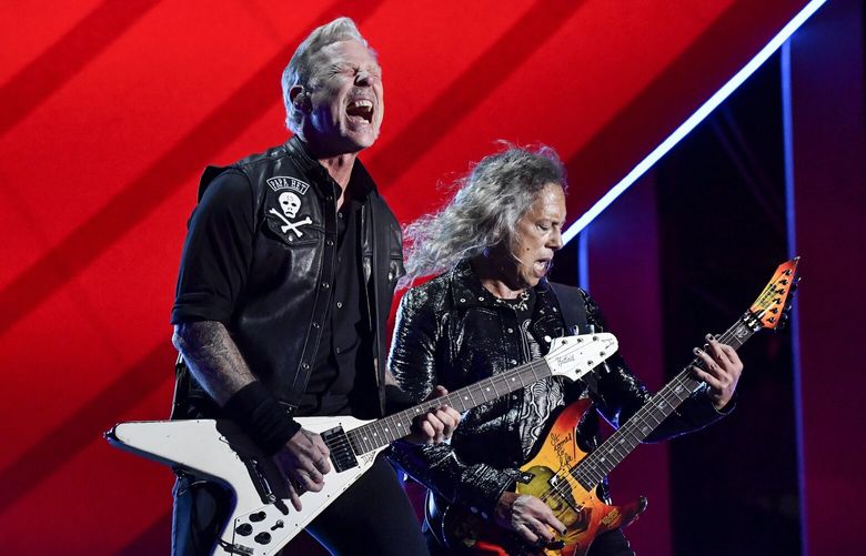 James Hetfield, left, and Kirk Hammett of Metallica perform during the Global Citizen Festival on Saturday, Sept. 24, 2022, at Central Park in New York. (Photo by Evan Agostini/Invision/AP)
