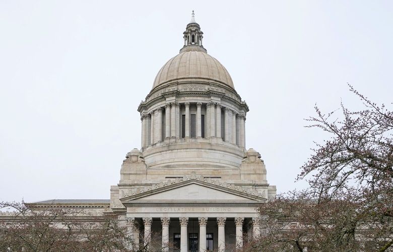 The sun dial near the Legislative Building is shown under cloudy skies, Thursday, March 10, 2022, at the Capitol in Olympia, Wash. Washington lawmakers were wrapping up their work Thursday with final votes on a supplemental state budget and a transportation revenue package before planning to adjourn the legislative session. (AP Photo/Ted S. Warren) 219783