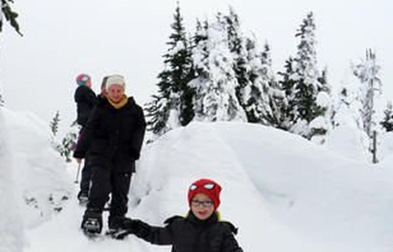 This photo taken Jan. 7, 2017, shows Miles Walton, 4, of Port Angeles, leads his family on a snowshoe walk at Hurricane Ridge, Wash., (Caitlin Moran / The Seattle Times via AP)



This photo taken Jan. 7, 2017, shows Miles Walton, 4, of Port Angeles, leads his family on a snowshoe walk at Hurricane Ridge, Wash., (Caitlin Moran / The Seattle Times via AP)
 (Caitlin Moran / )