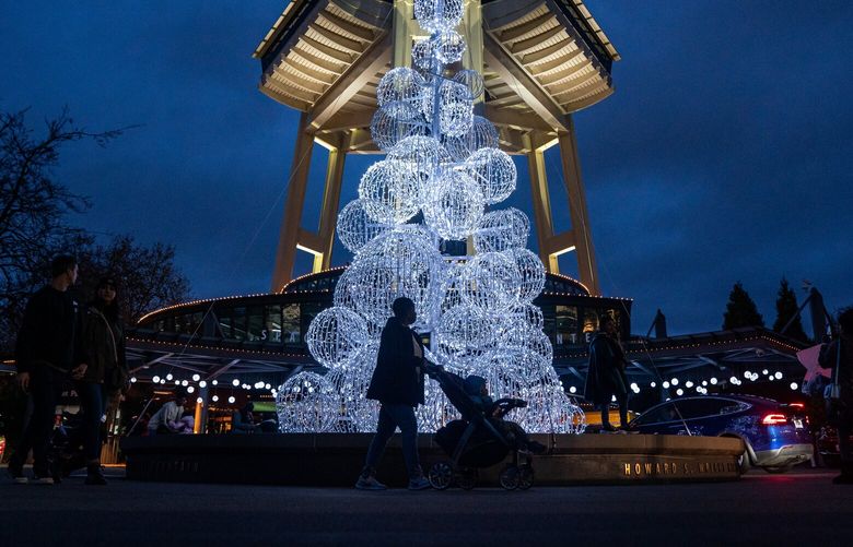 The Space Needle Christmas tree lights up the night on Saturday, Nov. 26, 2022.
