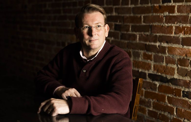 Chief technology officer Kaj Pedersen is photographed at the AstrumU office in Kirkland on Wednesday on Nov. 30, 2022. Formerly a H1B worker, he has resided in the United States for 27 years. He says around 10 out of approximately 50 of the company’s employees hold H1B visas.