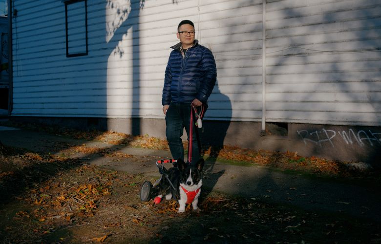 Hung Truong, who remembers feeling relieved after sharing online about his layoff from Lyft at the start of the pandemic, at his home in Seattle, Nov. 8, 2022. As Twitter, Meta and other companies that helped create a culture of more workplace transparency slash their work forces, some laid off employees are very publicly using those social media platforms to critique their former employers. (Grant Hindsley/The New York Times)