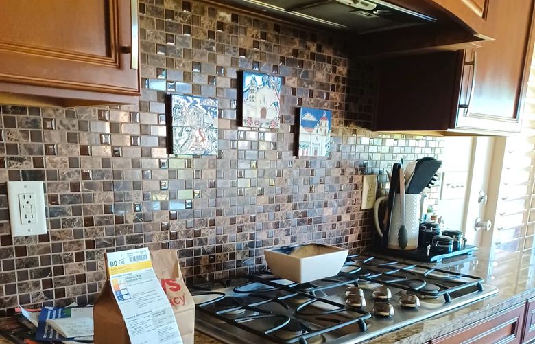 While it may seem complex, installing a ceramic tile kitchen backsplash is a prime DIY task. (Tribune Content Agency)
