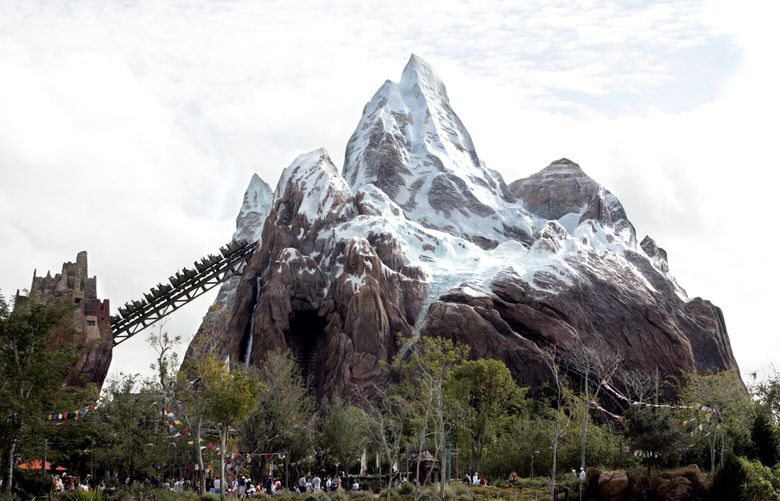 ** FOR IMMEDIATE RELEASE **Visitors ride the Expedition Everest roller coaster at the Animal Kingdom park at Walt Disney World in Lake Buena Vista, Fla. on Thursday, Feb. 2, 2006. Everest, set to open April 7, features a train navigating an 80-foot drop, rumbling over bridges and through valleys backward and forward to escape a fierce yeti monster, which has twisted and broken the tracks. (AP Photo/John Raoux)
NY423