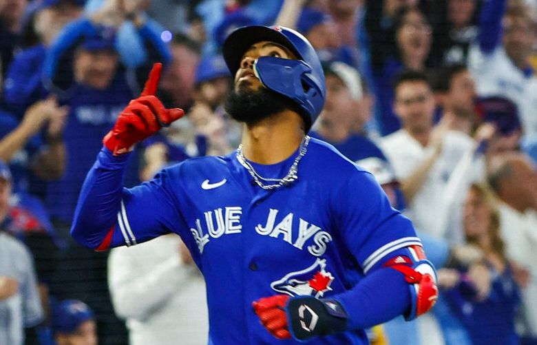 Toronto’s Teoscar Hernandez celebrates his 2-run homer off Mariner’s starting pitcher Robbie Ray in the second inning as the Seattle Mariners played the Toronto Blue Jays in Game 2 of the American League Wild Card Game Saturday, Oct. 8, 2022 at Rogers Centre, in Toronto, Ontario, Canada.
 221789