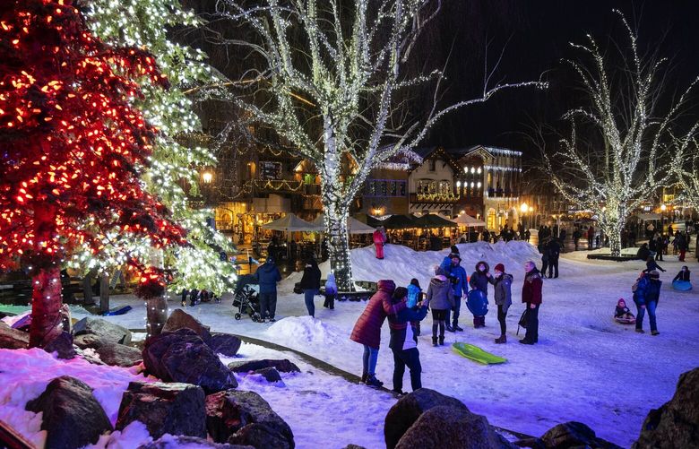 Despite having to cancel its Christmas Lighting Festival due to Covid-19, the city of Leavenworth will still have Christmas lights up until Valentine’s Day. This past weekend’s snow helped give Leavenworth a holiday glow that drew notable crowds to shop, dine, and recreate.
Photographed Saturday, January 30, 2021. 216295