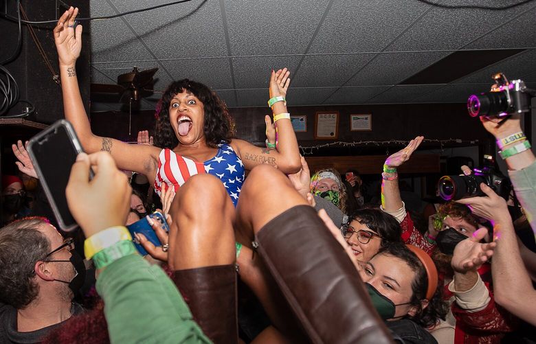 Eva Walker of the Black Tones surfs her way through a set at Freakout 2021.