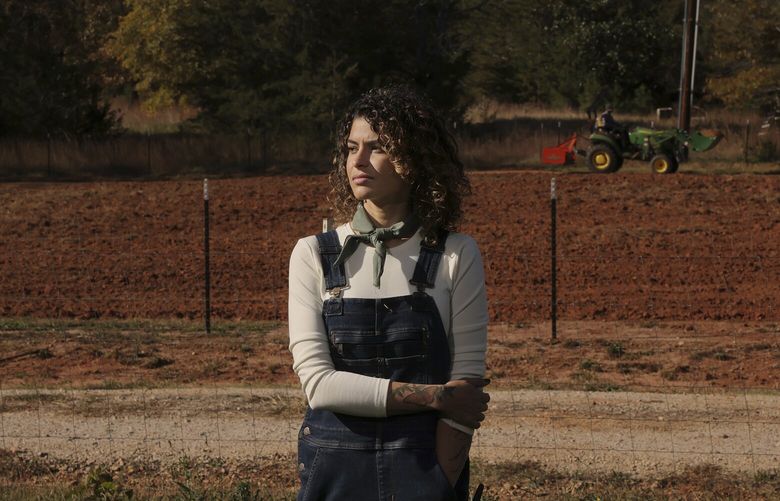 Tasha Trujillo at her newly relocated flower farm in York, S.C., on Oct. 28, 2022. Unable to afford land in her native Florida, Trujillo recently moved her flower farm to South Carolina. (Travis Dove / The New York Times)