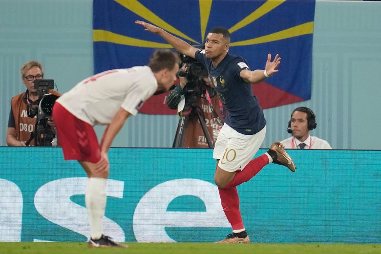 France advances to knockout stage of World Cup after 2-1 win over Denmark