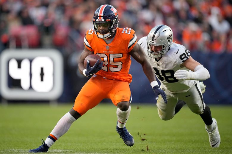 Denver Broncos' Melvin Gordon III celebrates after scoring a touchdown  during the NFL International match at Wembley Stadium, London. Picture  date: Sunday October 30, 2022 Stock Photo - Alamy