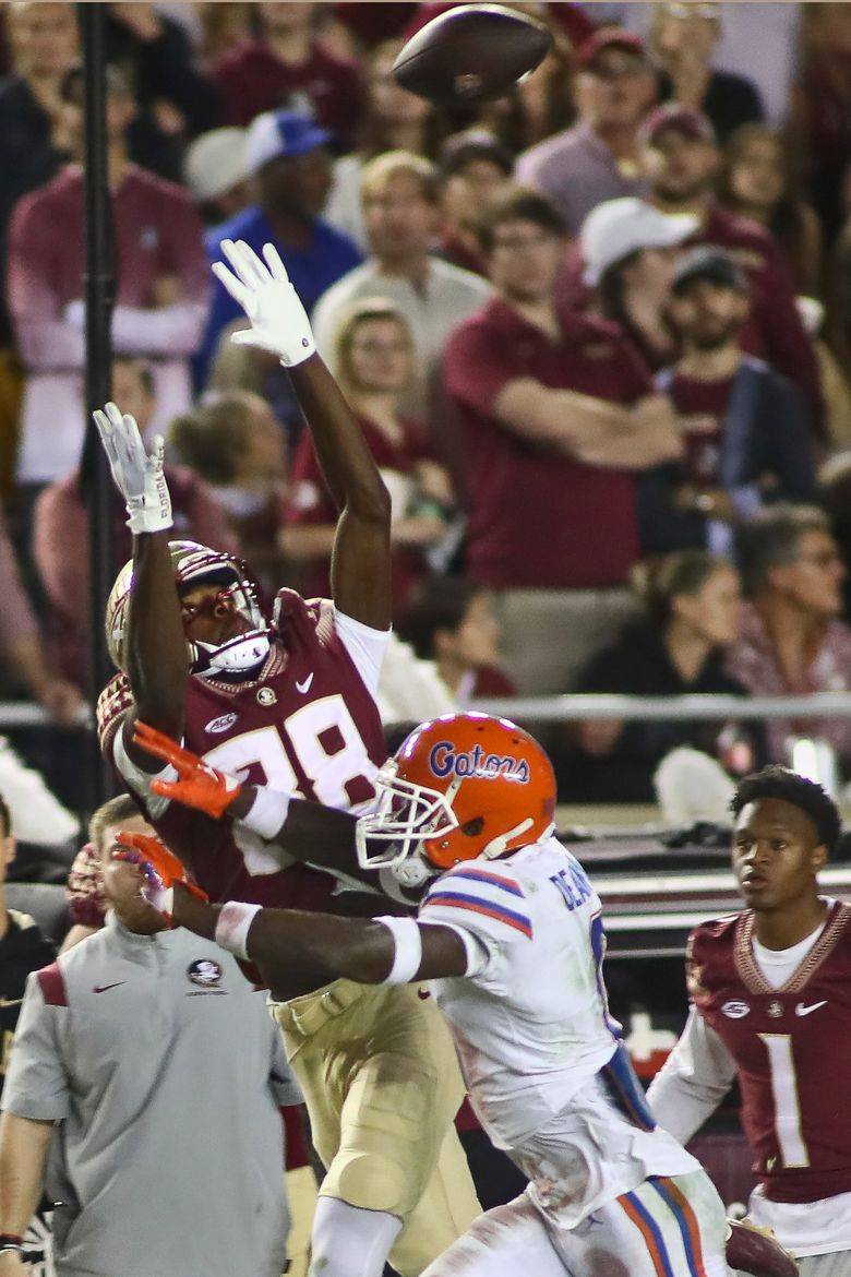 No. 16 Florida State runs wild over Florida for 45-38 win | The Seattle  Times