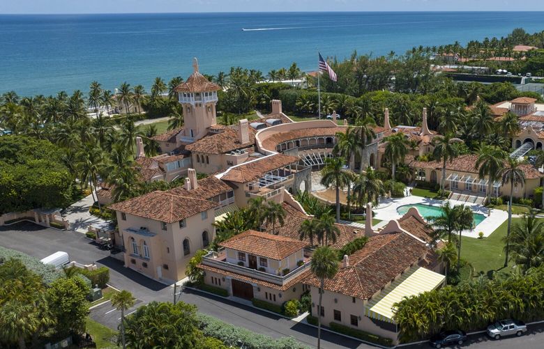 FILE – Former President Donald Trump’s Mar-a-Lago club is seen in the aerial view in Palm Beach, Fla., Aug. 31, 2022. A federal appeals court has halted an independent review of documents seized from the estate, removing a hurdle the Justice Department said had delayed its criminal investigation into the retention of top secret government information. (AP Photo/Steve Helber, File) WX130 WX130