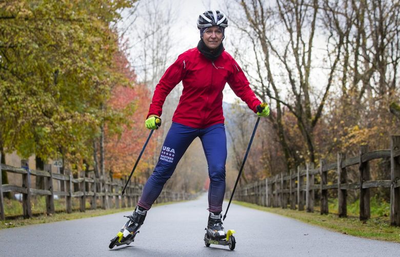 Martha Bellisle, an AP global investigations reporter by day and a top-flight biathlon athlete, trains  on roller-skis for a competition on a trail on the east side of Lake Sammamish Monday, November 28, 2022.

 222302