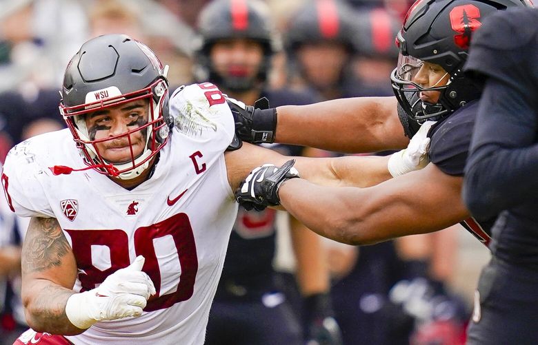 Washington State defensive end Brennan Jackson (80) tries to get around Stanford offensive tackle Walter Rouse during the first half of an NCAA college football game in Stanford, Calif., Saturday, Nov. 5, 2022. (AP Photo/Godofredo A. Vásquez) CAGV151