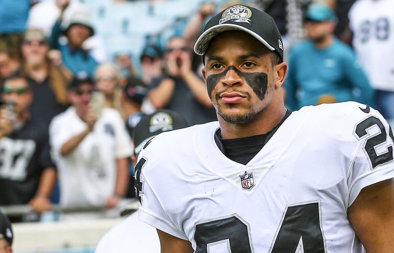 Las Vegas Raiders safety Johnathan Abram (24) jogs onto the field to for an NFL football game against the Jacksonville Jaguars on Sunday, Nov. 6, 2022, in Jacksonville, Fla. (AP Photo/Gary McCullough) NYOTK