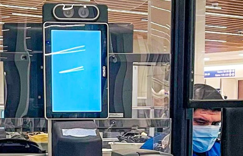 A TSA security checkpoint at Los Angeles International Airport uses facial recognition technology to verify passenger identities.