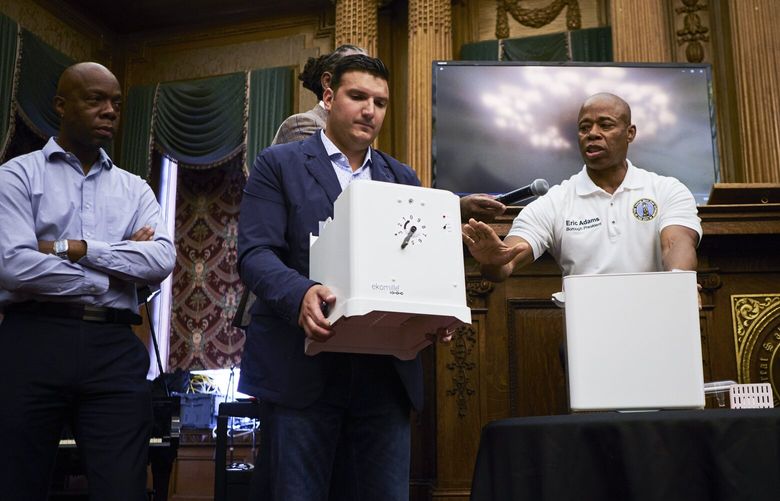 FILE — Eric Adams, then the Brooklyn borough president, demonstrates a new technique for trapping and drowning rats during a news conference in Brooklyn, Sept. 5, 2019. New York City is seeking a new director of rodent mitigation to tackle a task that many mayoral administrations have futilely taken on before. (John Taggart/The New York Times)