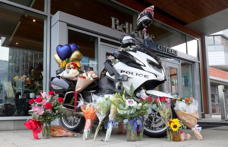 Outside Bellevue Police Headquarters a memorial has been erected in honor of fallen Bellevue Police Motorcycle Officer Jordan Jackson, who died Monday, November 21, 2022. 222273