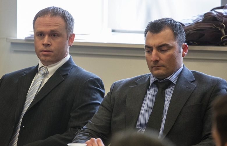 Monday, January 30, 2017. The two Seattle officers involved in todays inquest in the police shooting of Che Taylor are Officer Michael Spaulding, left and Officer Scott Miller at right. The Inquest was being held in the King County Courthouse.
